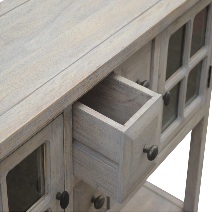 Sigtuna Glazed Console Table in Stone, shown with a drawer open.