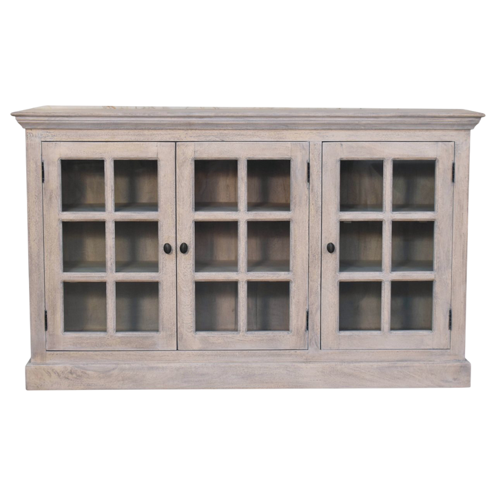 Sigtuna Glazed Sideboard in Stone, front view. Weathered acid-washed hardwood with three glazed doors.