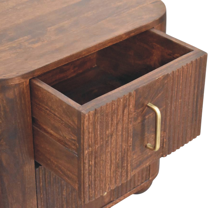 Skagen Fluted Bedside Table in Chestnut, shown with a drawer open.
