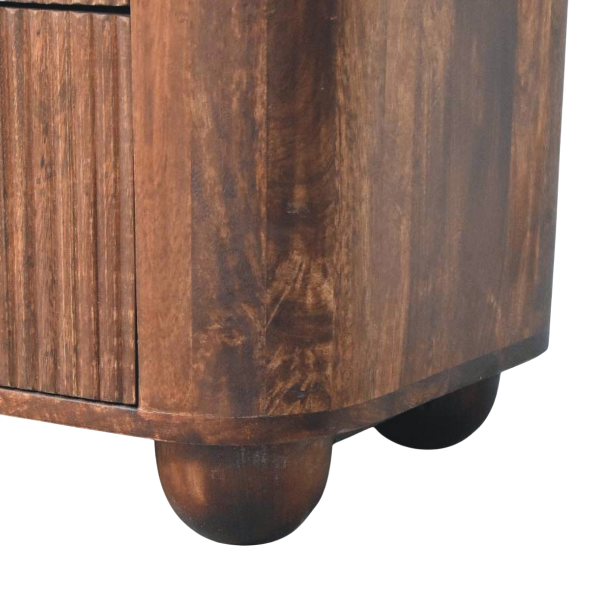Close view of the feet on the Skagen Fluted Bedside Table in Chestnut.