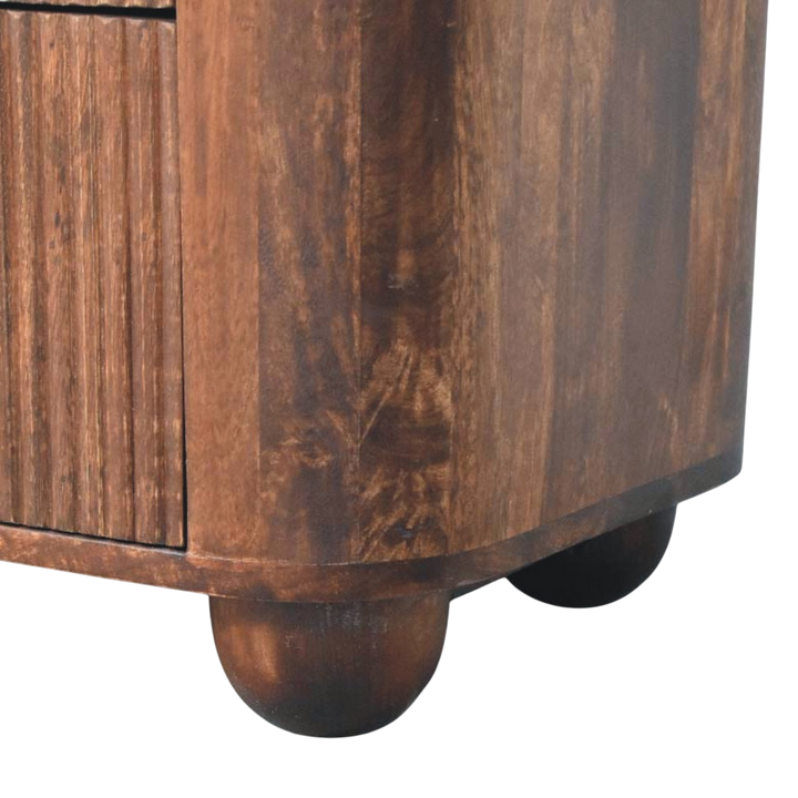 Close view of the feet on the Skagen Fluted Bedside Table in Chestnut.