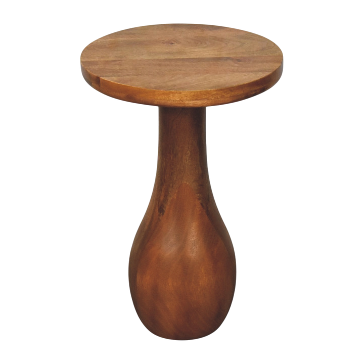 Soller Pedestal Drink Table in Amber, three-quarter view showing the full profile.