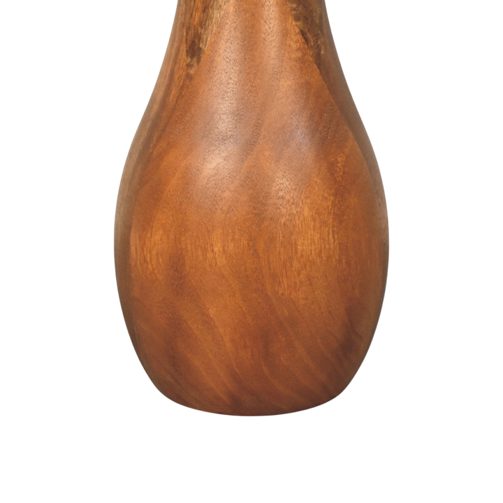 Close view of the base on the Soller Pedestal Drink Table in Amber.