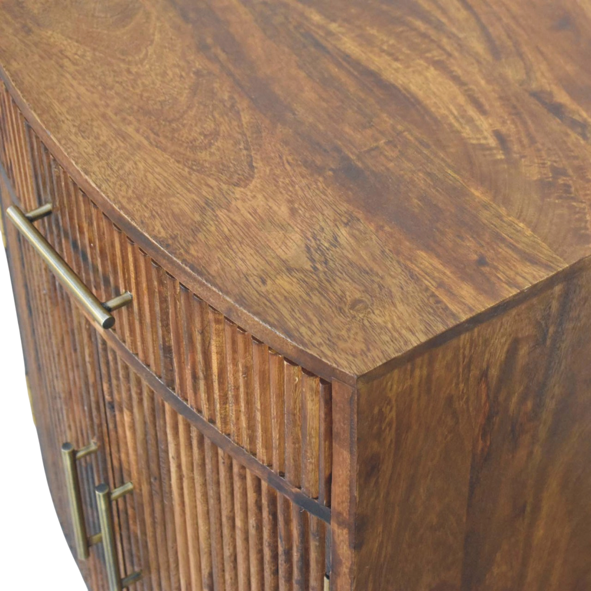 Close view of the brass hardware on the Sorrento Fluted Bedside Cabinet in Chestnut.