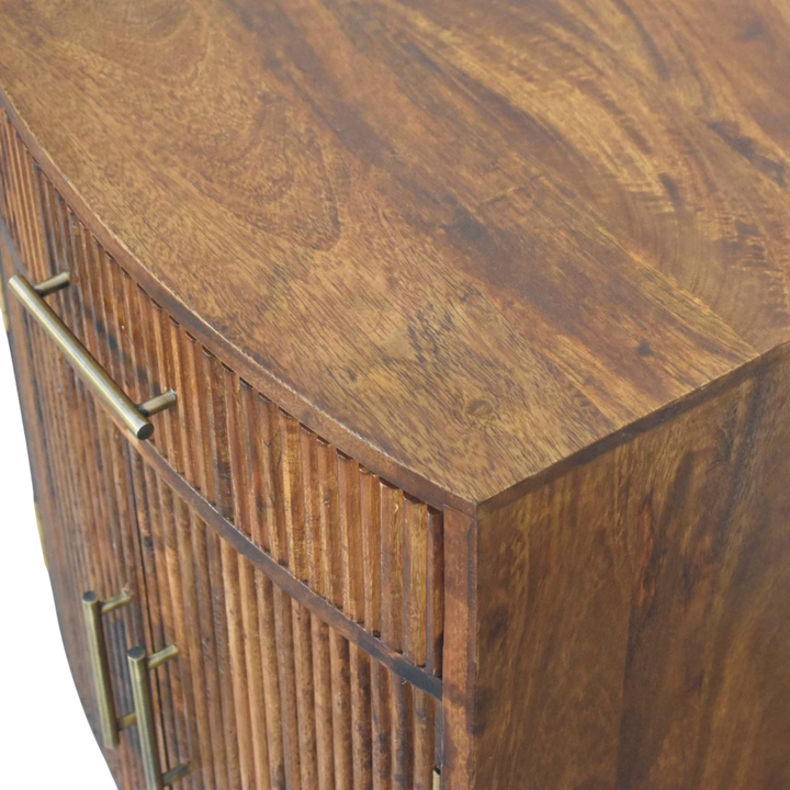 Close view of the brass hardware on the Sorrento Fluted Bedside Cabinet in Chestnut.