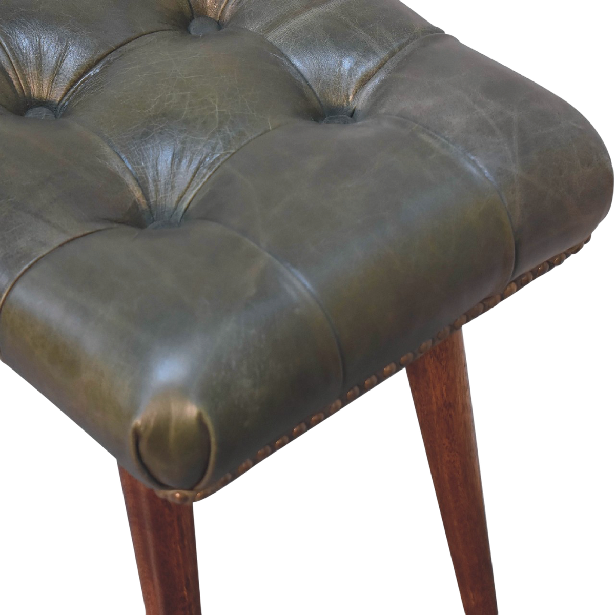 Close view of the buttoning on the Sussex Deep-Buttoned Footstool in Olive Leather.