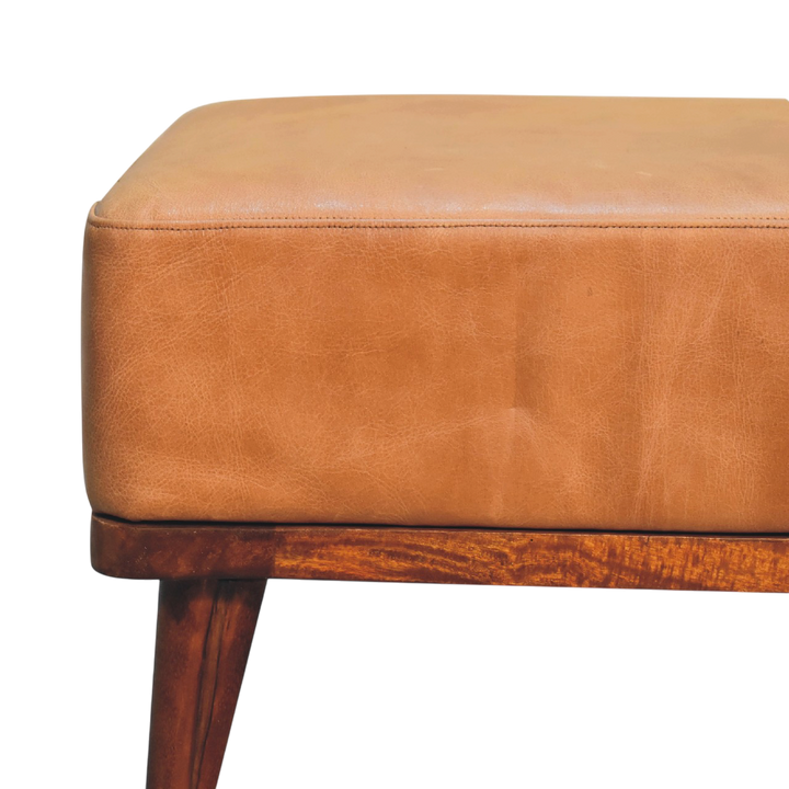 Close view of the seat on the Sussex Leather Footstool in Blonde Saddle.