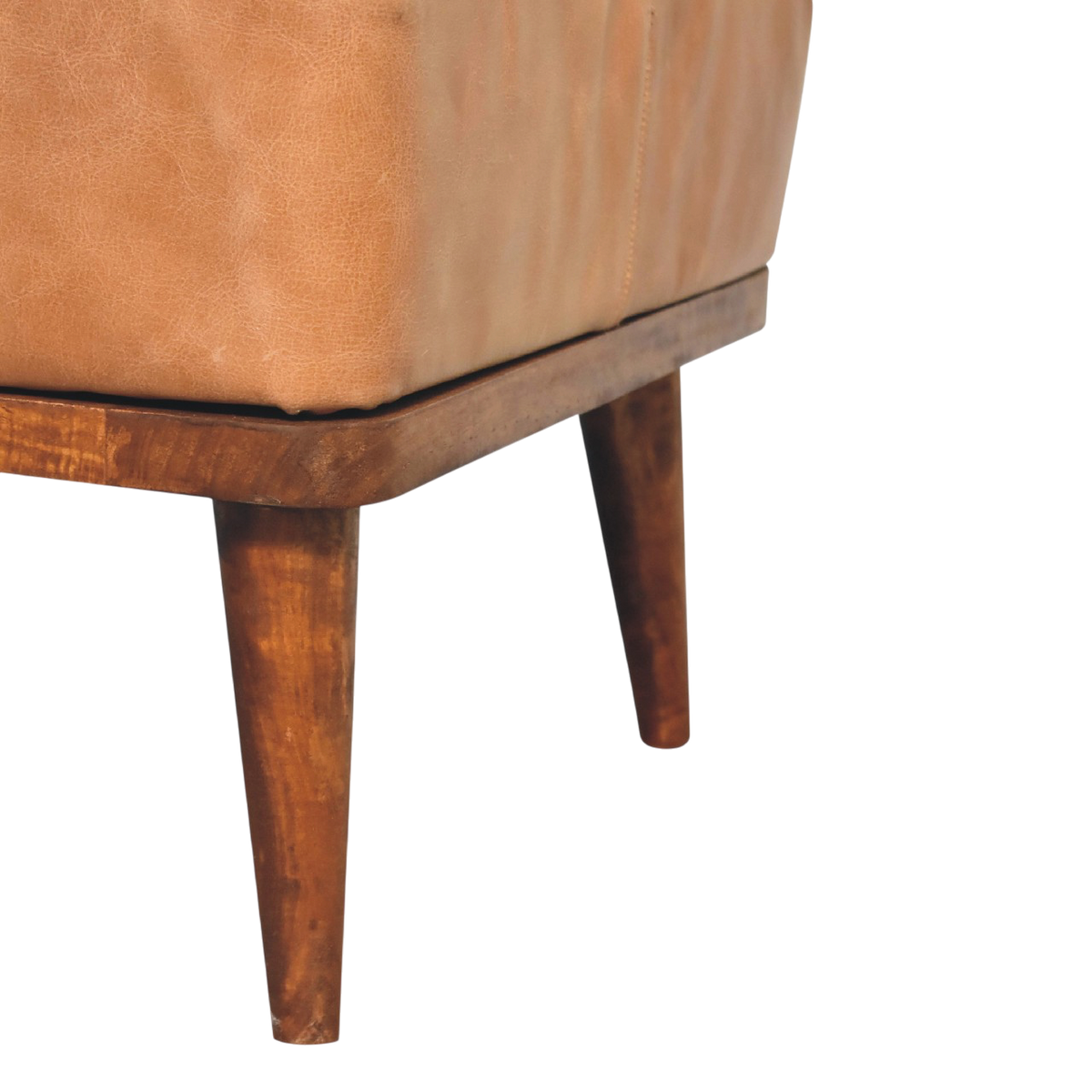 Close view of the legs on the Sussex Leather Footstool in Blonde Saddle.