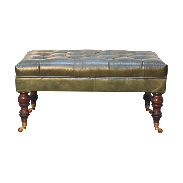 Sussex Leather Ottoman in Antique Green, front view. Button-tufted green leather on turned chestnut legs with brass castors.