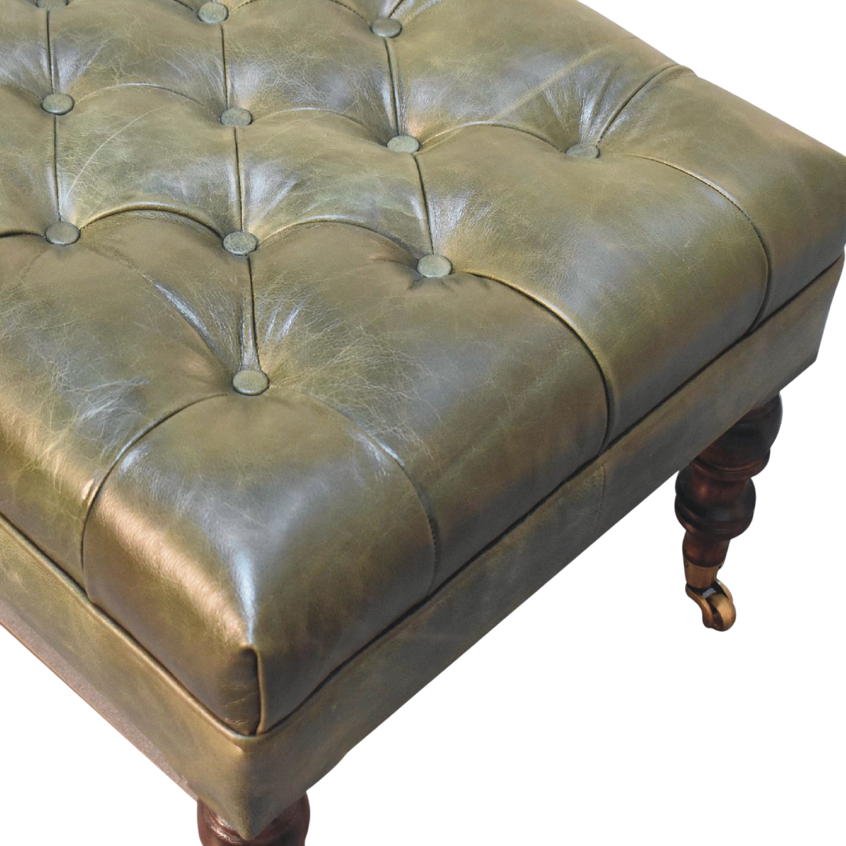Close view of the button tufting and upholstery on the Sussex Leather Ottoman in Antique Green.