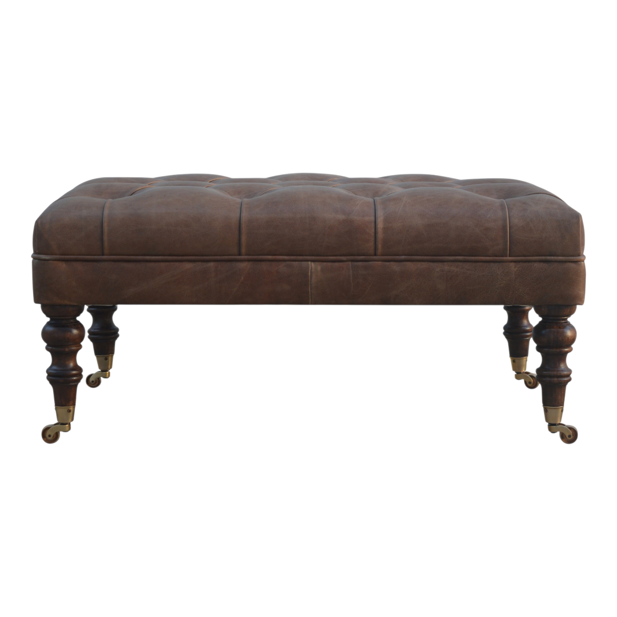 Sussex Leather Ottoman in Cocoa, front view. Cocoa leather over a solid hardwood frame, deep-buttoned top, hand-turned feet in a pale honeyed finish.