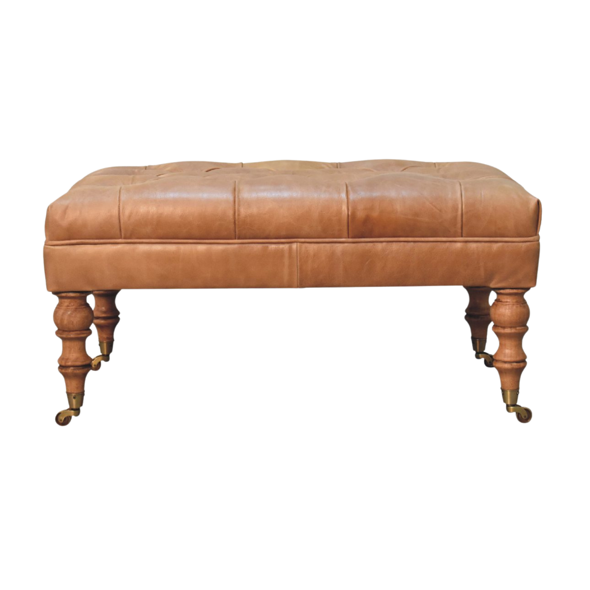 Sussex Leather Ottoman in Warm Biscuit, front view. Warm biscuit leather top on turned chestnut legs with brass castors.
