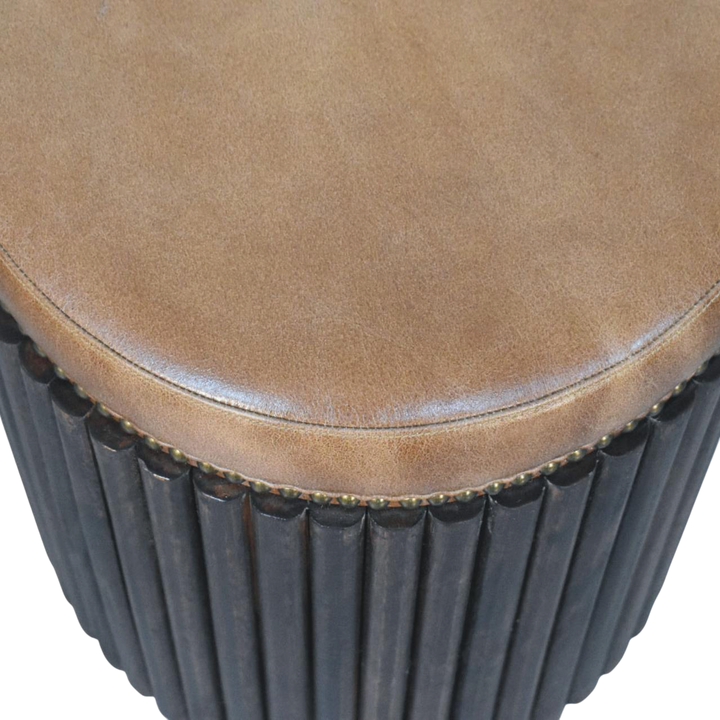 Close view of the stud trim on the Sussex Ribbed Leather Stool in Tobacco.