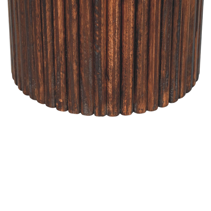 Close view of the carved detailing on the Sussex Ribbed Leather Stool in Tobacco.