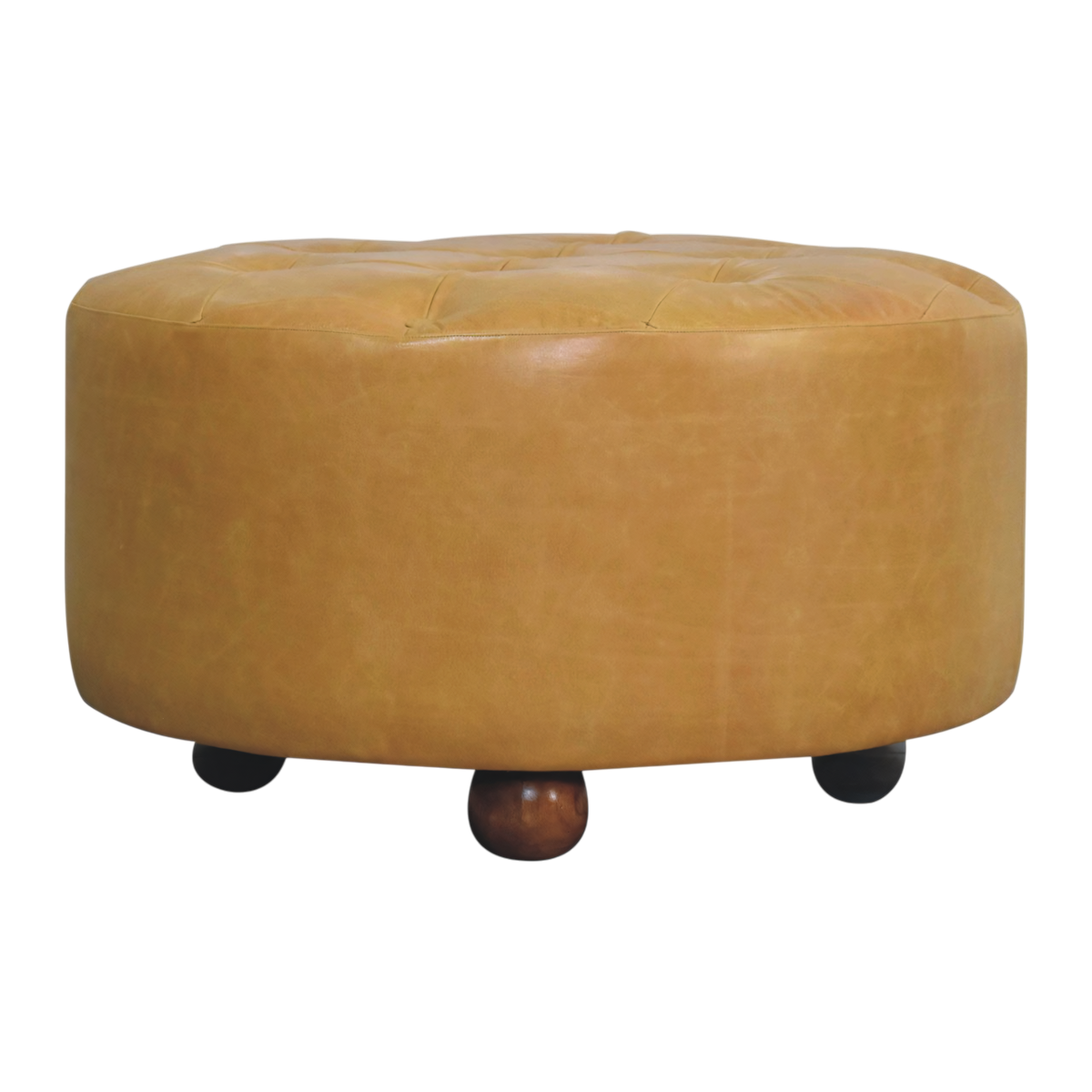Sussex Round Leather Coffee Table in Blonde Saddle, front view. Blonde saddle leather over a round solid hardwood frame, deep-buttoned top, turned ball feet.
