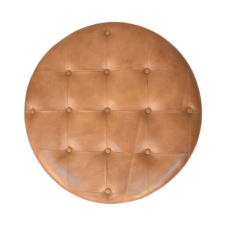 Sussex Round Leather Ottoman in Burnt Caramel, shown from above.
