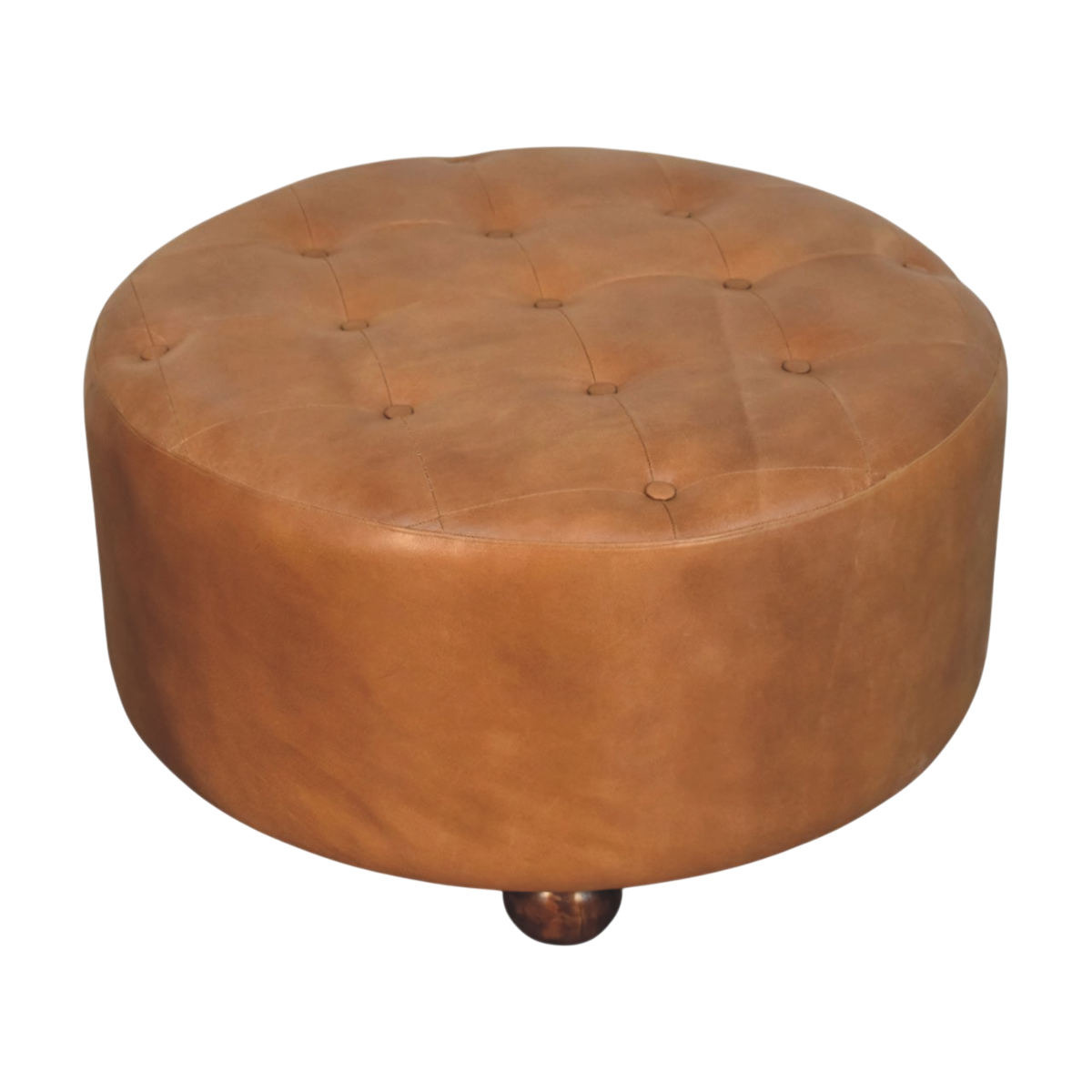 Close view of the hand-set buttoning on the Sussex Round Leather Ottoman in Burnt Caramel.