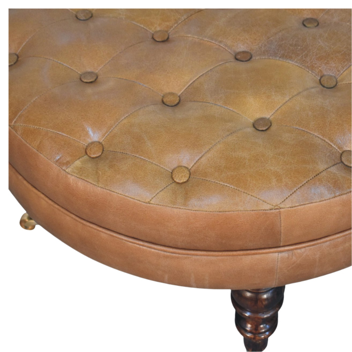 Sussex Round Leather Ottoman in English Toffee seen from above, showing the stitched leather top.