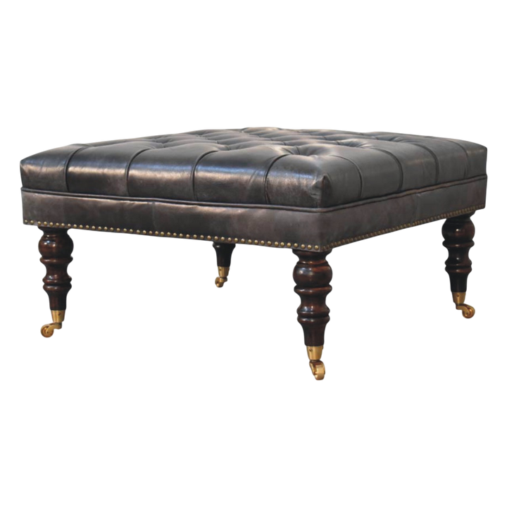 Sussex Square Leather Ottoman in Espresso, three-quarter view showing the full profile.