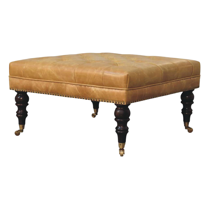 Sussex Square Leather Ottoman with Nailheads in Blonde Saddle, three-quarter view showing the full profile.