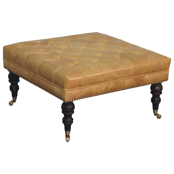 Sussex Square Leather Ottoman with Nailheads in Blonde Saddle, raised three-quarter view showing the top surface.
