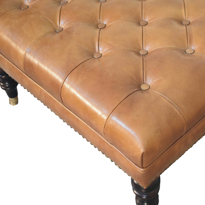 Close view of the buttoning on the Sussex Studded Leather Ottoman in Blonde Saddle.