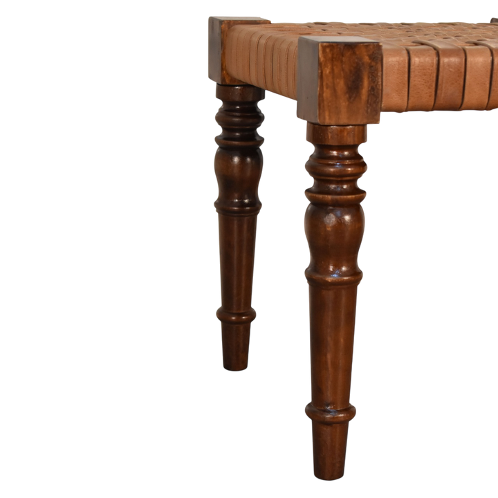 Close view of the legs on the Sussex Woven Leather Footstool in Chestnut.