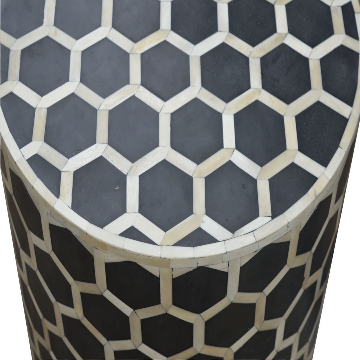 Close view of the inlay on the Tivoli Inlay Footstool in Charcoal.