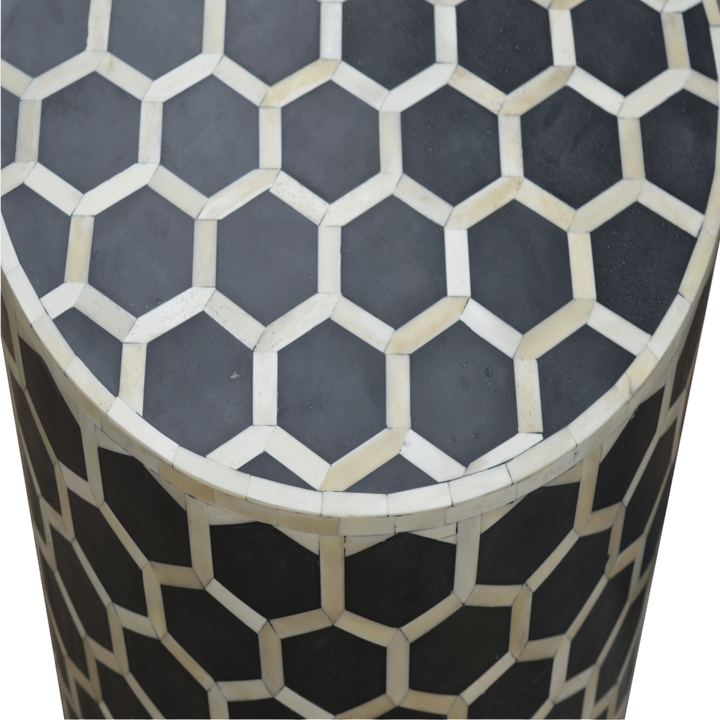 Close view of the inlay on the Tivoli Inlay Footstool in Charcoal.