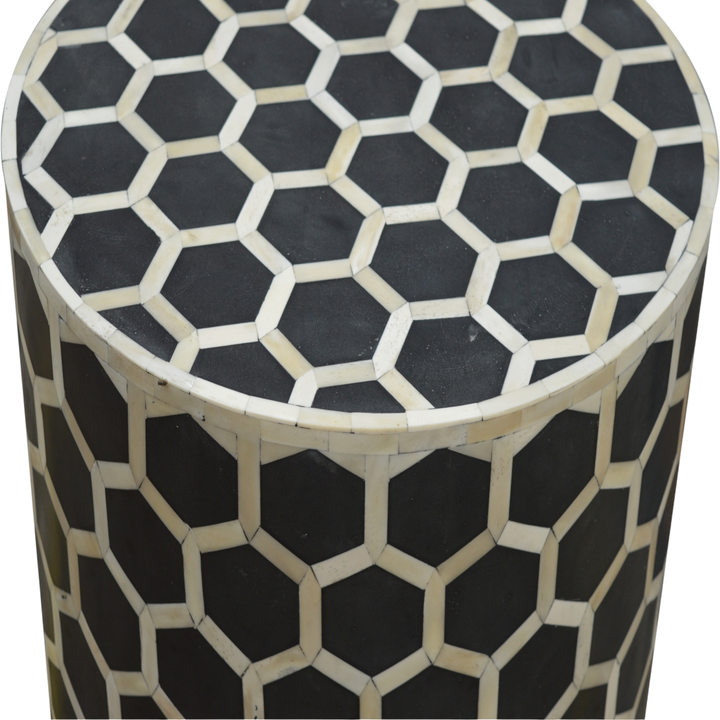 Close view of the edge on the Tivoli Inlay Footstool in Charcoal.