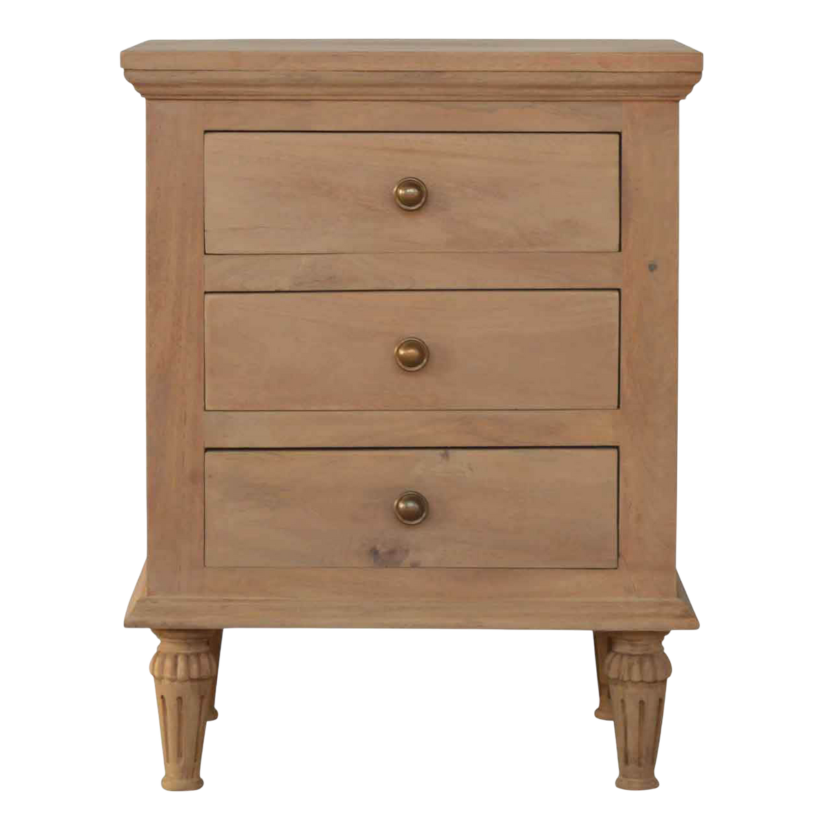 Trosa Bedside Table in Almond, front view. Sun-bleached hardwood, three drawers with brass ring pulls.