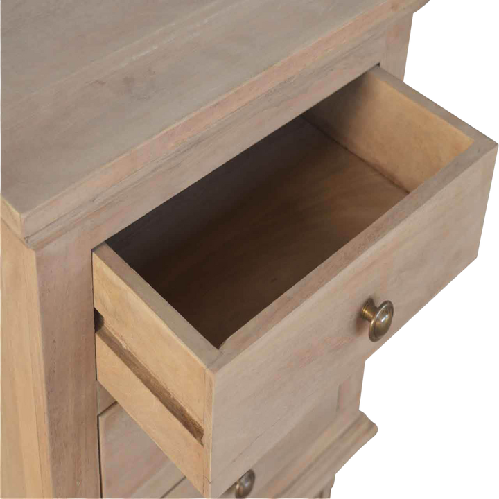 Trosa Bedside Table in Almond, shown with a drawer open.