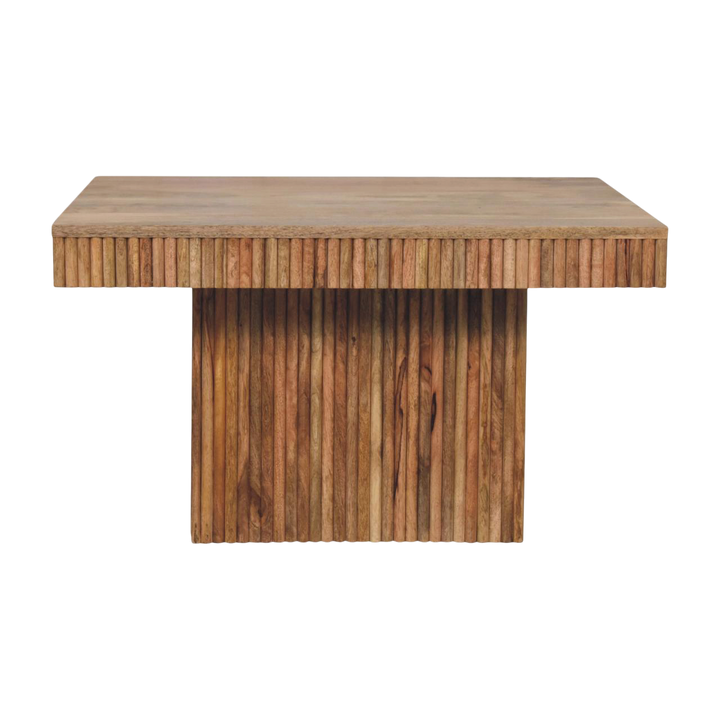 Trosa Block Coffee Table in Amber, front view. 100% solid hardwood in a natural amber finish, thick stepped and ridged base, square top.