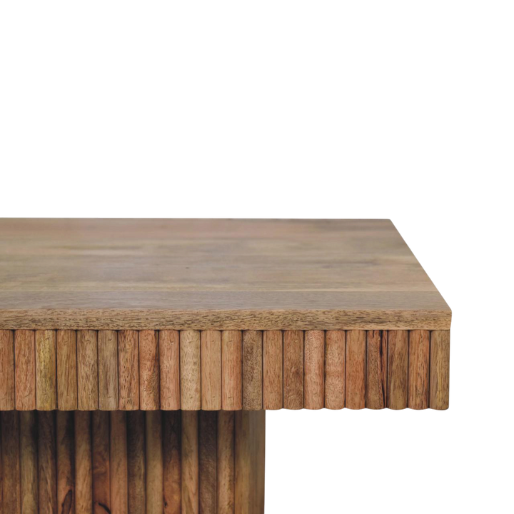 Close view of the top on the Trosa Block Coffee Table in Amber.
