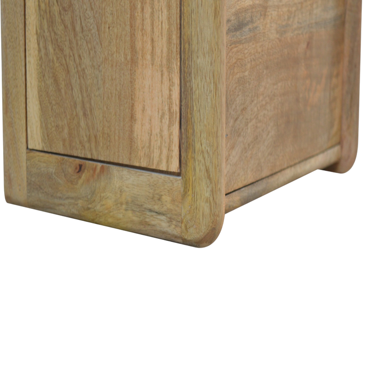 Close view of the base on the Trosa Gallery-Back Bedside Table in Amber.