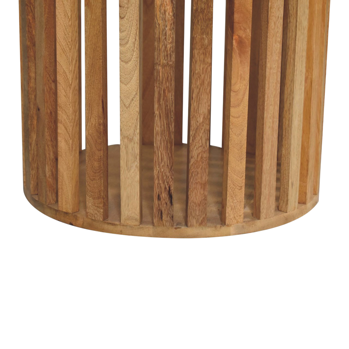 Close view of the base on the Trosa Round Dining Table in Amber.