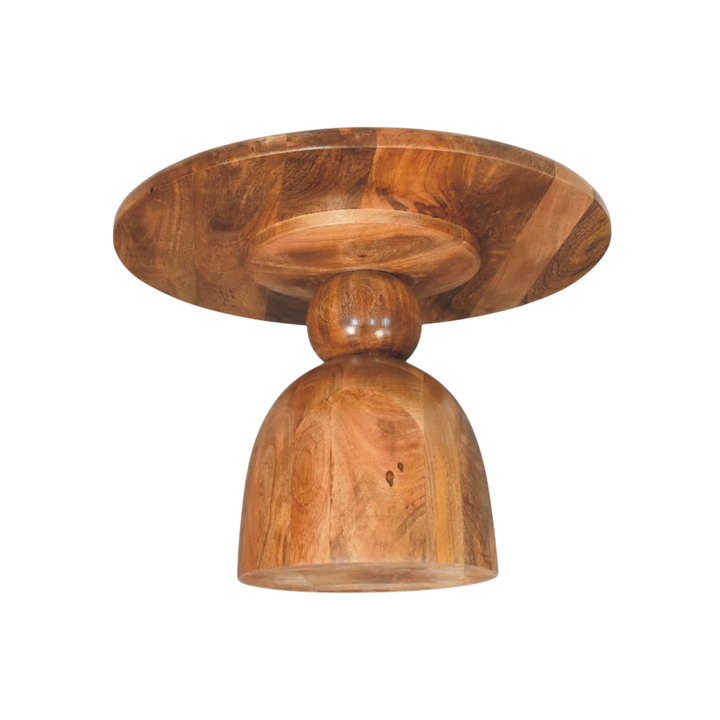 Vallauris Pedestal Coffee Table in Amber, raised three-quarter view showing the top surface.