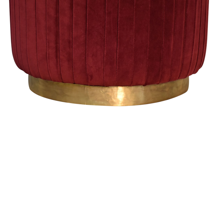 Close view of the base on the Vallauris Pleated Footstool in Claret Velvet.