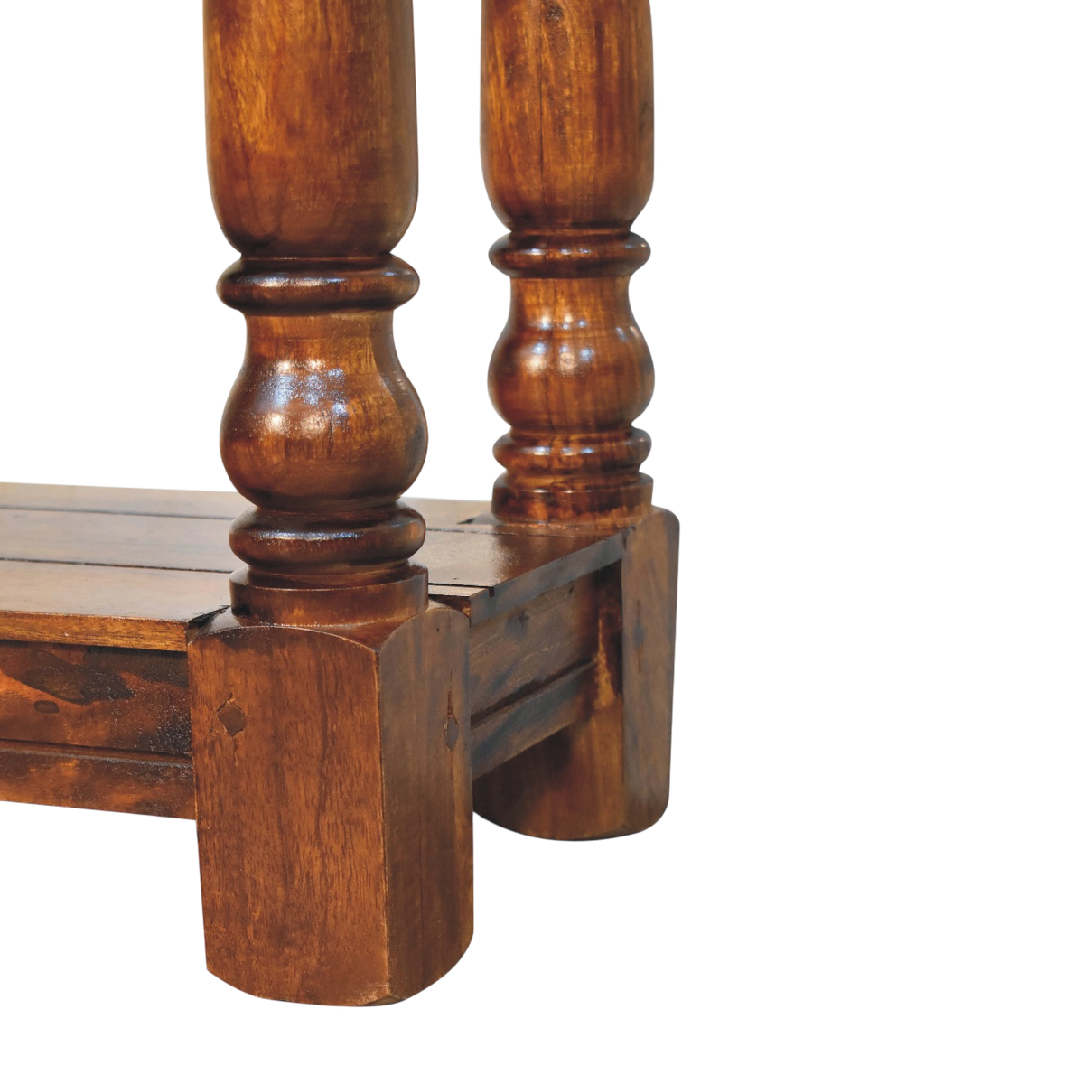 Close view of the legs on the Wetherby 4-Drawer Console Table in Chestnut.