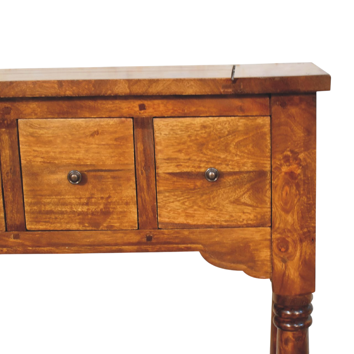 Close view of the drawer front on the Wetherby 4-Drawer Console Table in Chestnut.
