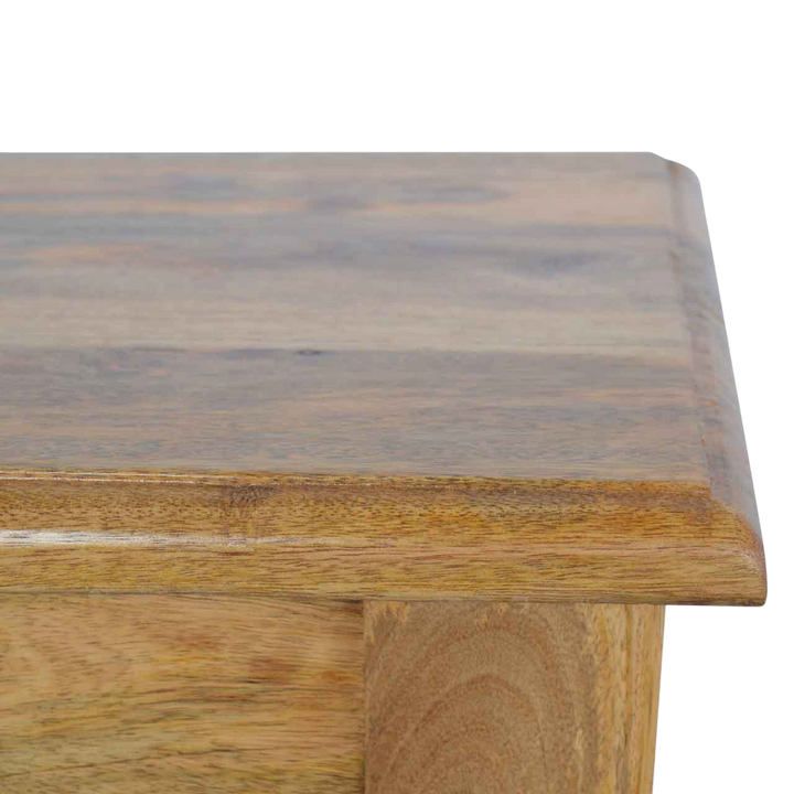 Close view of the top on the Wetherby Dining Bench in Amber.
