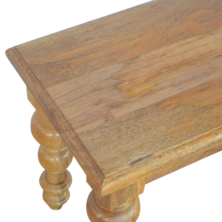 Close view of the legs on the Wetherby Dining Bench in Amber.