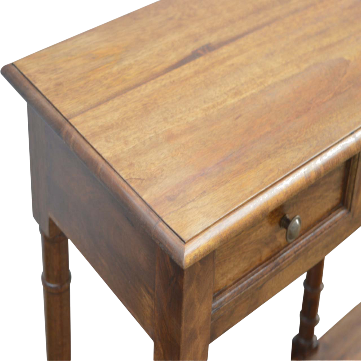 Close view of the grain on the tabletop on the Wetherby Tiered Hallway Console in Chestnut.