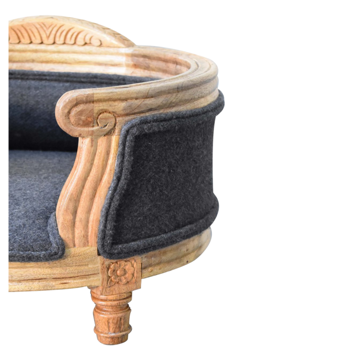Close view of the hand-carved detail on the Windsor Pet Bed frame.