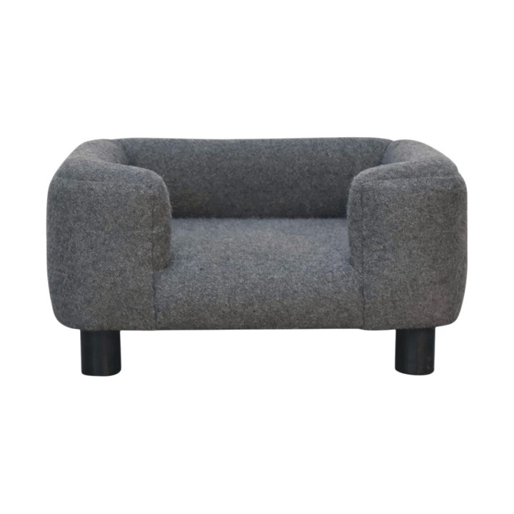 Winton Mini Pet Bed in Grey Tweed, front view. Tweed upholstery with a padded cushion on short dark feet.